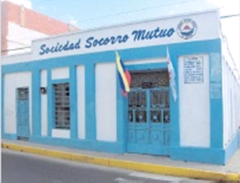 Fotografía: Sede de la Sociedad Socorro Mutuo de Valle de la Pascua, institución fundada en la residencia de Domingo Shettino el 05 de agosto de 1923. IPC, 2004.